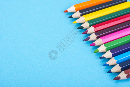 文具蓝底彩色铅笔工作室照片文具蓝底彩色铅笔图片
