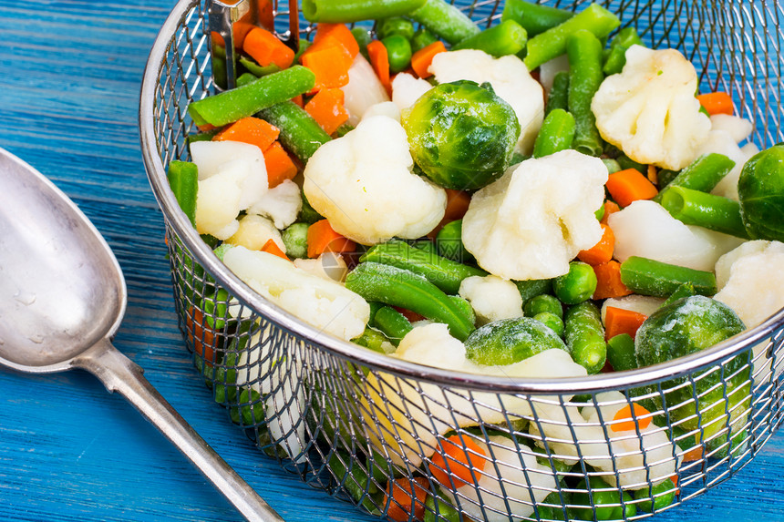 与布鲁塞尔和菜花胡萝卜豆和类的冷冻混合蔬菜与布鲁塞尔和菜花豆类的冷冻混合蔬菜图片