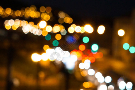 圣诞节的灯光装饰晚上在街背景图片