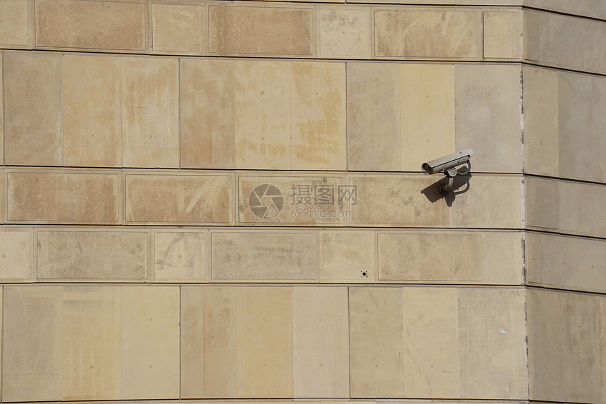 建筑物墙上的安全摄像头图片