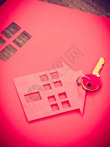 安全产权不动进入概念房屋用钥匙隔绝房屋符号在地板上背景图片