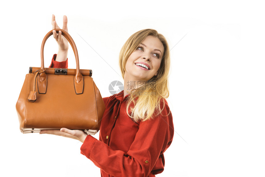 白棕色皮包的优美时装年轻女子手皮包的时装妇女图片