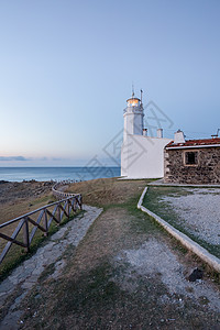 薄公英土耳其锡诺普北部海岸旧白色英氏灯塔的日落视图背景