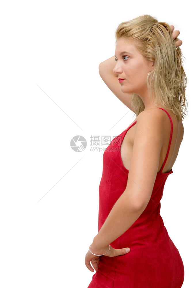 穿着白色背景红礼服的漂亮金发年轻美女图片