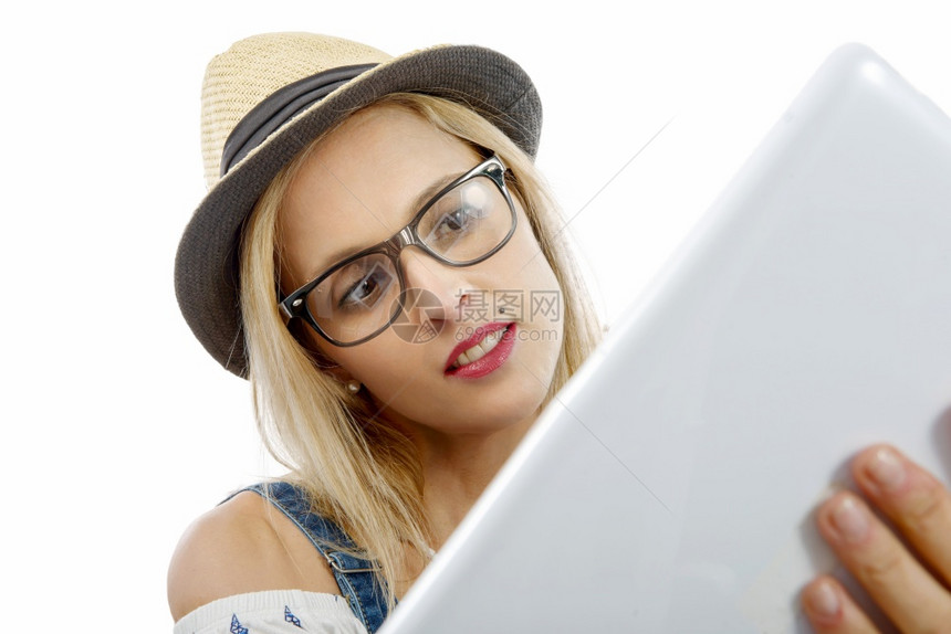 拥有平板电脑的金碧色美中年妇女图片