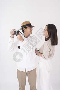 情侣拍摄美丽的游客照背景图片