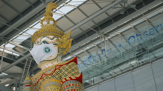 泰国机场201年3月日曼谷苏尔纳布胡密机场Yakhas监护人雕塑的像背景