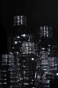 塑料瓶白色垃圾清洁黑色背景图片
