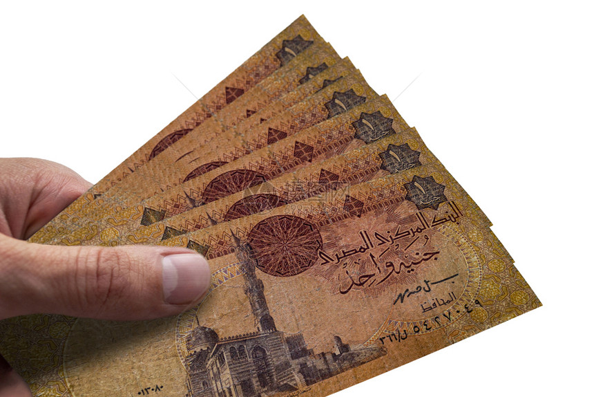 手持埃及镑EGP埃及货币图片
