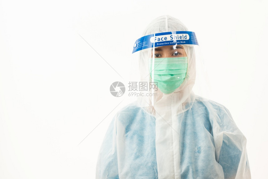 身穿个人防护设备制服穿戴面罩防护和塑料面的近身女医务人员以隔离白本的新冠COVID19爆发检疫图片