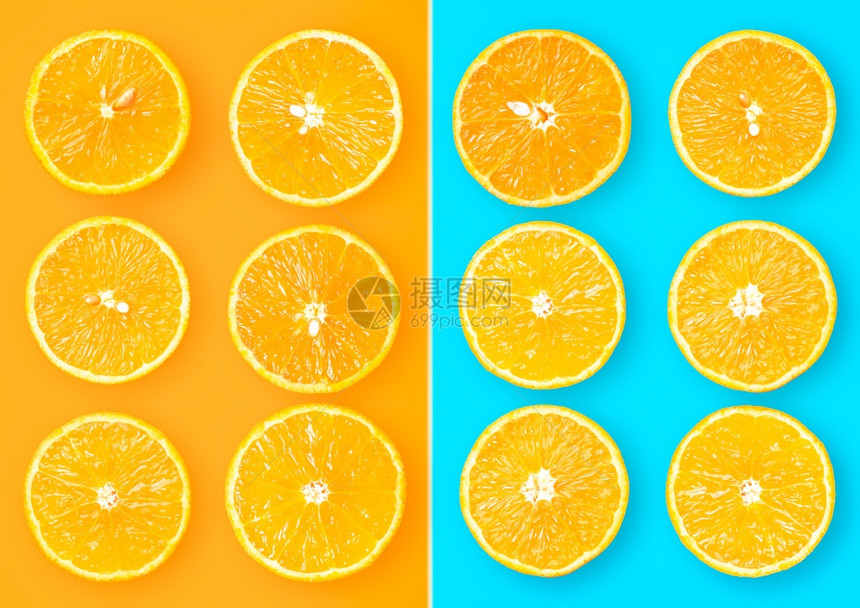 橙蓝色背景半切有机橙子为蓝色背景的有机橙子半切为的背景图片