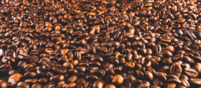 咖啡豆背景子胜于桌咖啡概念图片