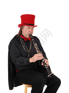 戴红帽子男人艺术音乐的高清图片