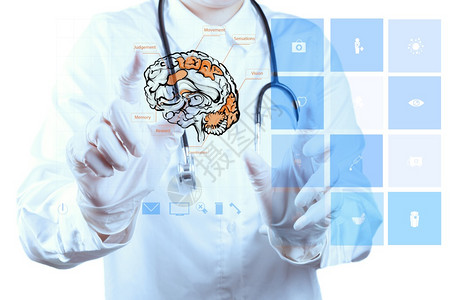 大脑大开带手套的医生用新电脑作为医疗概念用新电脑抽吸大背景