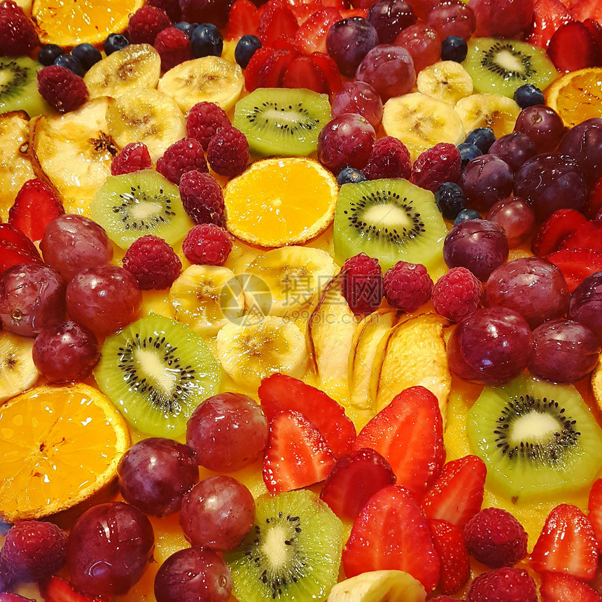 带水果和浆的假日蛋糕表面特制食物背景图片