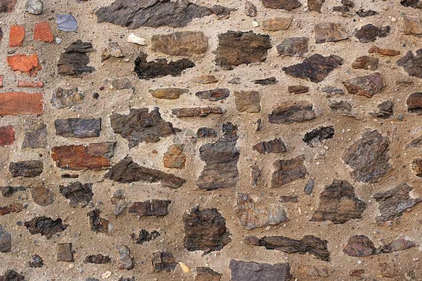 古老的墙有石块和砖紧闭的纹理图片