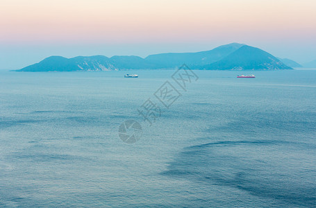 从Lefkas岛希腊莱夫卡达爱奥尼亚海的景中看小日落岛图片