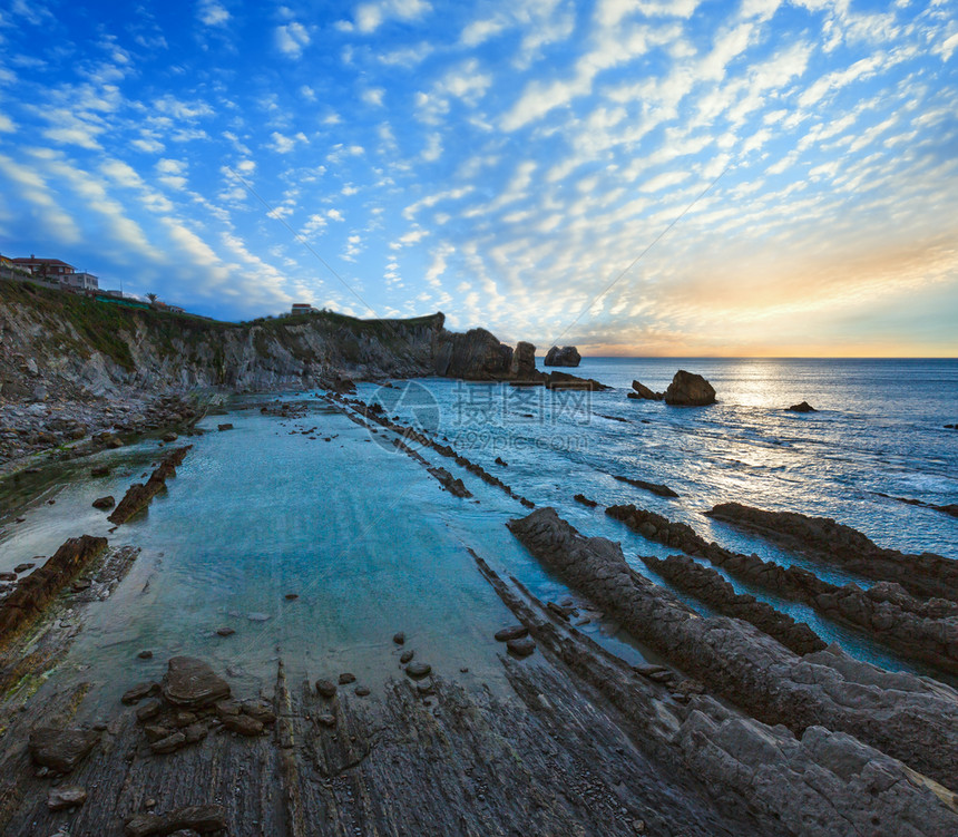 ArniaBeach西班牙大洋海岸线日落来自岩石图片