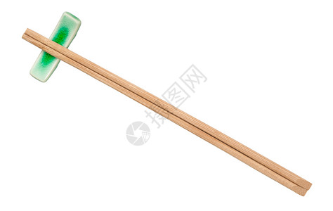 棕色木棍的顶部白底幕隔离在筷子休息处图片