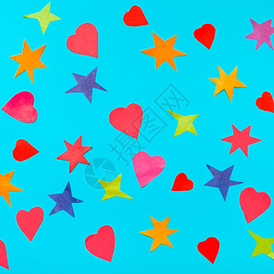 多色星和红心的拼图摘自蓝绿糊纸上的图片