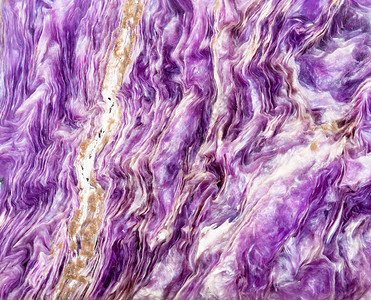 抛光天然紫色焦土岩的背景来自抛光天然焦土岩的背景图片