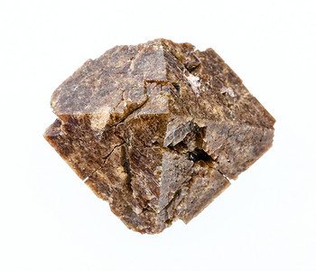 地质采集的天然矿物样本封存白色背景上分离的粗糙Zircon晶体图片