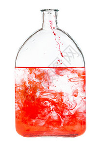 红染料在水中溶解隔着玻璃瓶水中溶解红染料图片