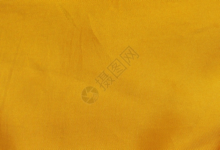 黄织物背景质地墙纸材料图片
