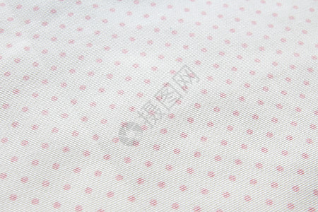 波尔卡带有粉红色圆点尘的浅灰棉织物粉色的复制背景图片