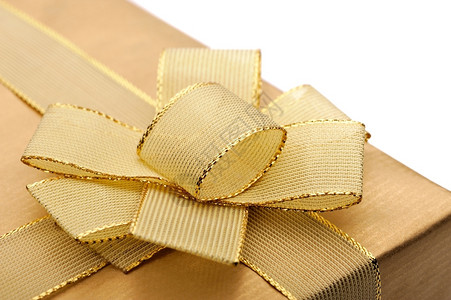 包裹金丝带绑在礼物盒的弓上领带一种图片