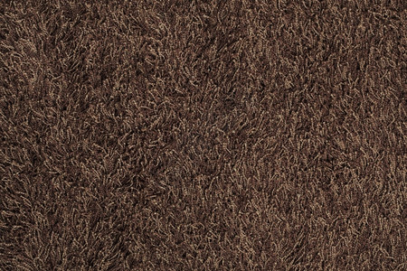 新的棕色毛地毯背景纹理茸的小地毯蓬松背景图片