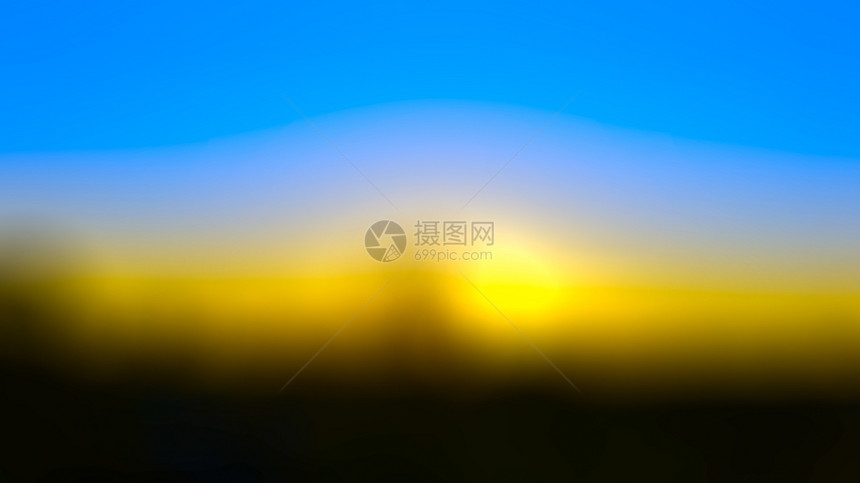 太阳蓝黄日落抽象模糊背景明亮的蓝色图片