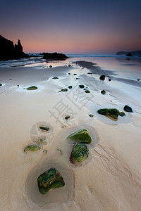 弗兰卡海洋西班牙阿斯图里亚州拉弗朗卡海滩的黄昏岩石图片
