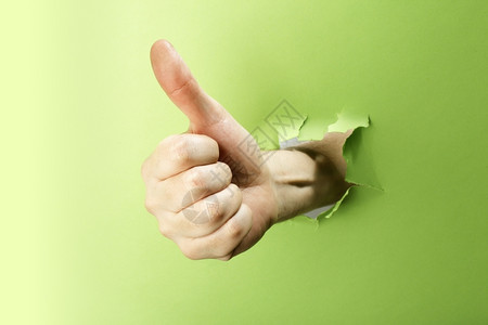 男人用大拇指做手势图纸洞制造201年4月选择图片