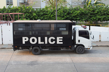 上市泰国警车运送囚犯的警车和用辆公共汽监狱图片