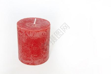 一种白色背景的红蜡烛治疗热图片