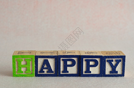 用积木拼成的字母happy背景图片
