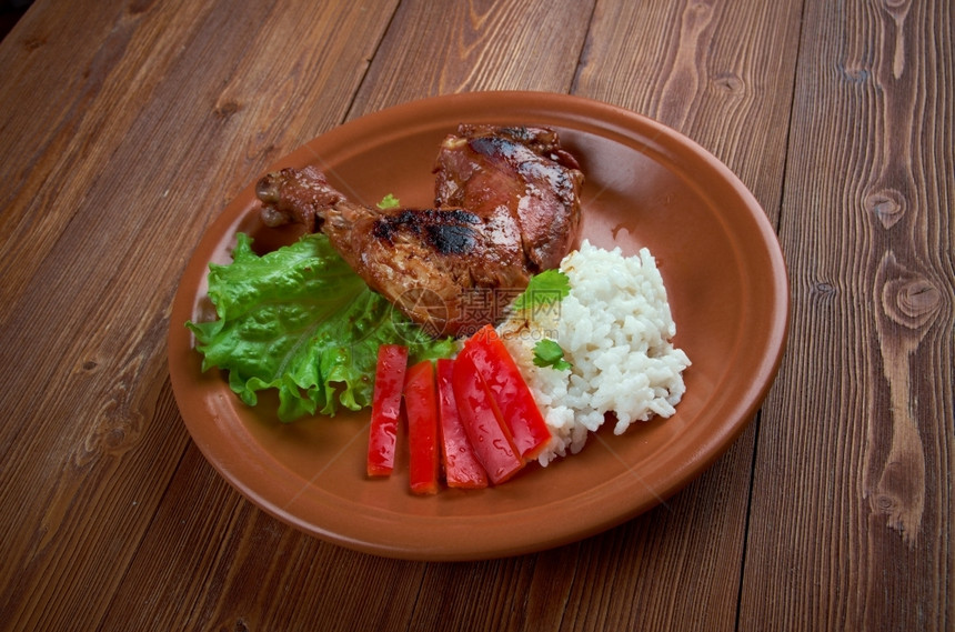 或者布基纳白饭PouletBicycellet一种美食布基那比料理或自行车鸡图片