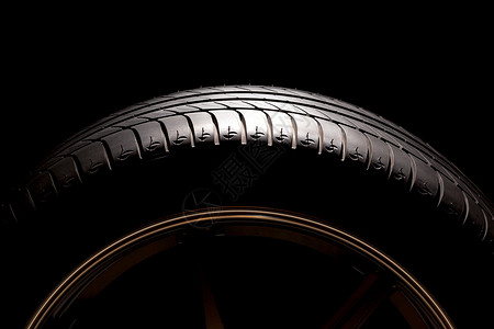 黑色背景的高能夏季汽车轮胎部分含黑色背景高的复制高清图片