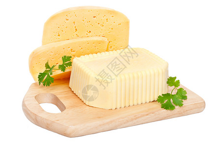 三块案板案板上的黄油和奶酪设计图片