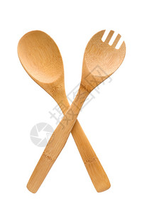 桌子家用餐具木叉和勺子作为路标跨越在白色背景上被孤立厨师象征图片