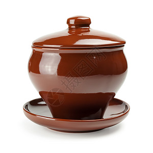 陶瓷公仔红陶土制的白色背景上棕陶瓷锅餐具背景
