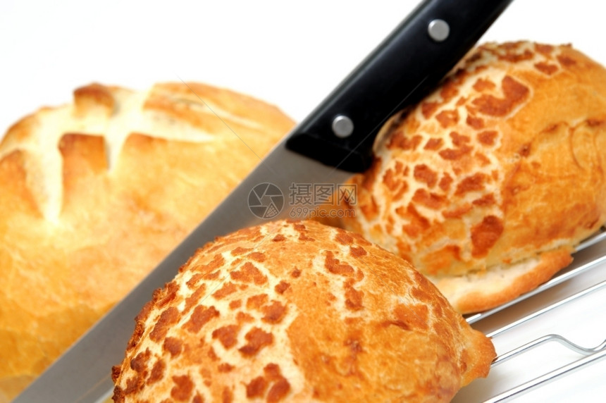 拓荒者面包和A劳斯A圆面包酸甜两个杜丘卷与刀切用食一种图片