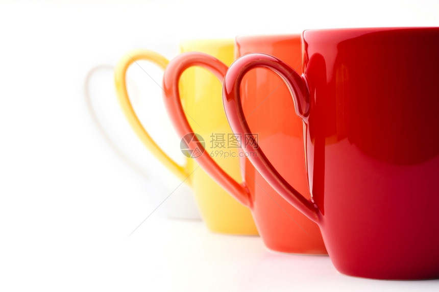 红色橙黄和白的明亮彩杯子白底黑的亮彩色杯子黄的陶器餐具图片