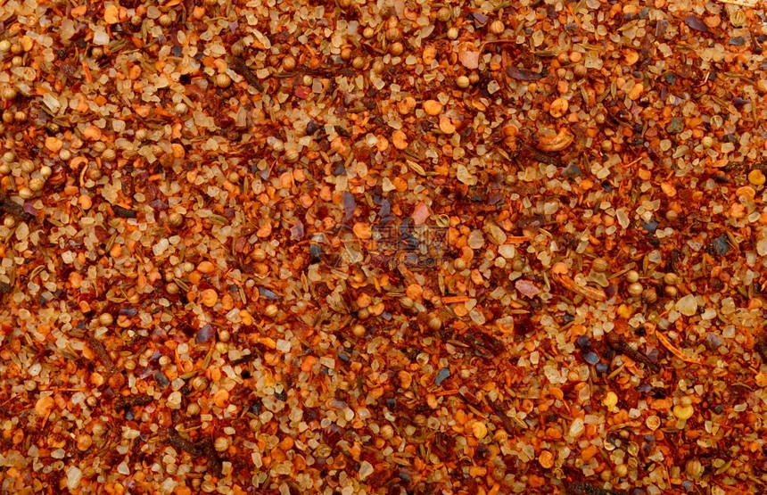堵塞喜马拉雅草药盐和辣椒接近的细节纹理背景图片
