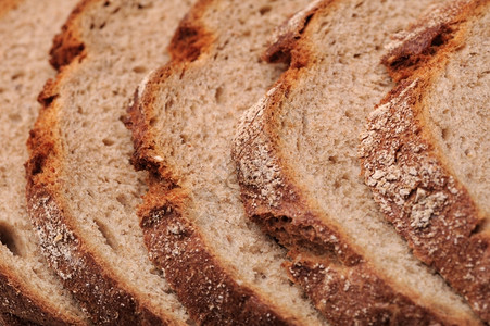 新鲜的黑暗切片新鲜面包的纹理俄罗斯背景图片