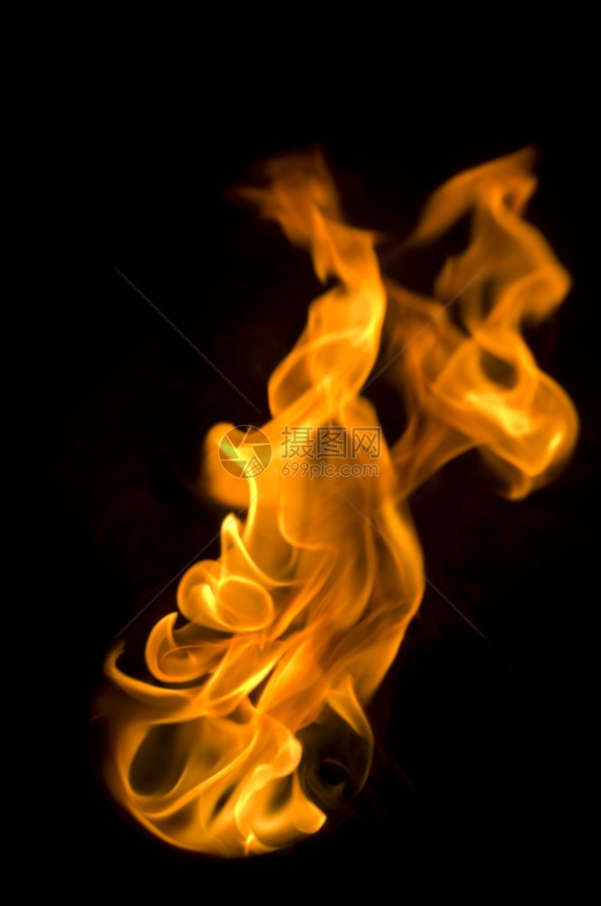 易燃有黑背景抽象的火烧营活力图片