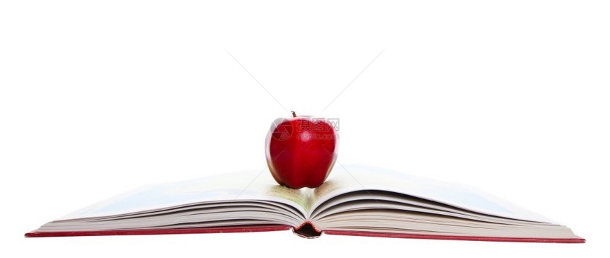放在书本上的苹果图片