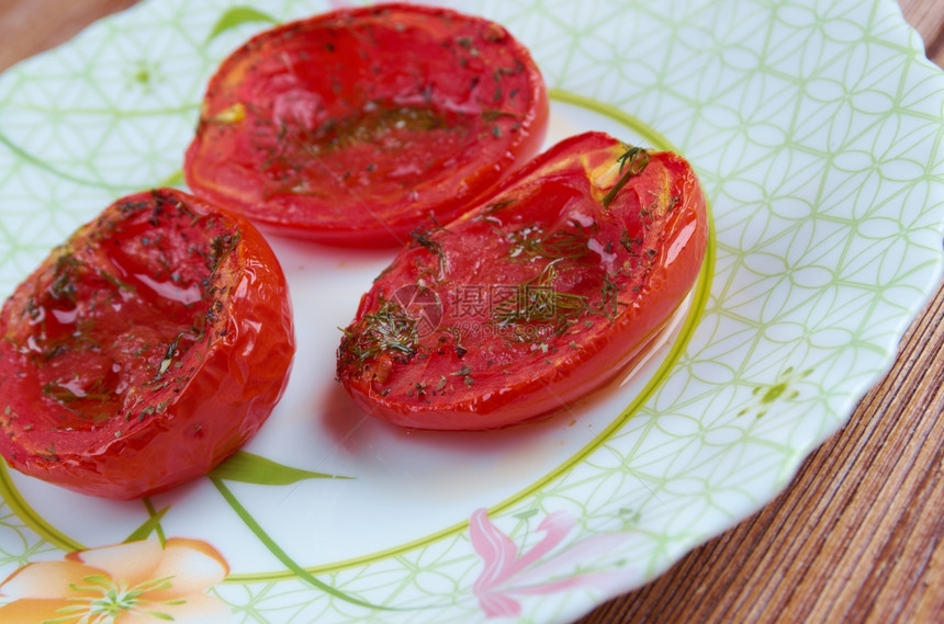 颜色油意大利烤西红柿意大利面粉和烤番茄摄影图片