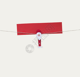 一个圣诞节男子穿着衣服贴在绳子上被白色隔绝男人快乐的为了图片